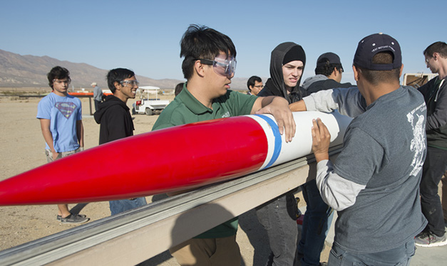 Rocketry students preparing rocket