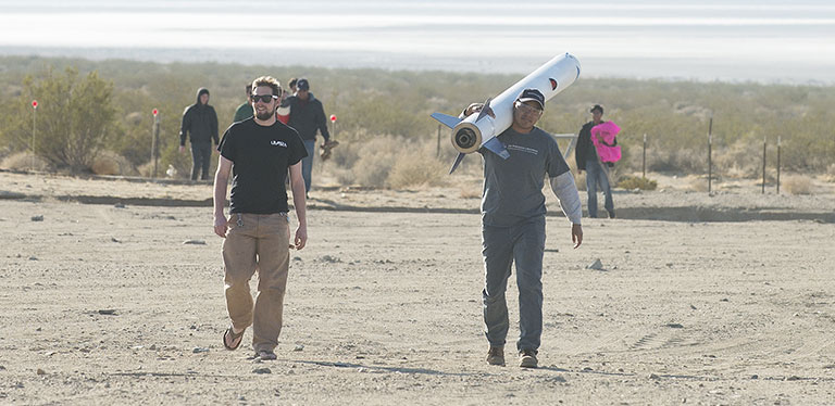Rocketry students in desert