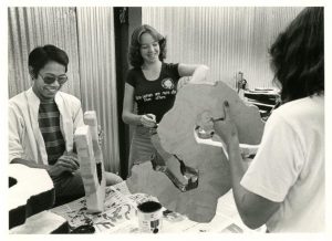 Students decorate the lettering on a float in the 1970’s.
