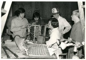 Students working on the electrical aspects of a float in the 1970’s.