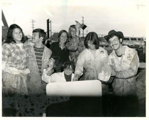 Students take a break from working on the 1977 float “Tons Of Fun.”