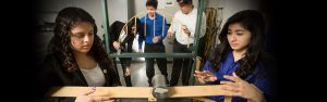 A group of students work together as a team in the Engineering Lab