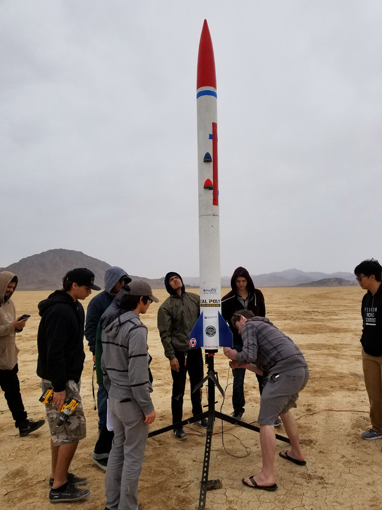 Students prepare a Patriot missile rocket for test launch.
