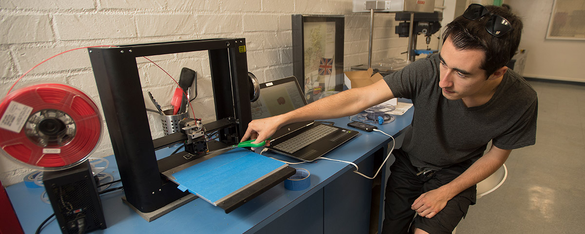 a student using a 3d printer