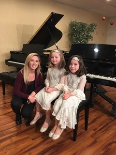 Francisca Escobar with her piano pupils